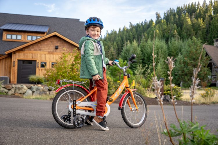 Boy with Bicycle and Helmet Inti St Clair Austin Texas Tumble Creek Scene Bikes