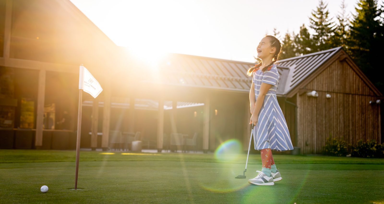 Laughing Girl on a Putting Green Inti St Clair Austin Texas Tumble Creek Scene Golf Green