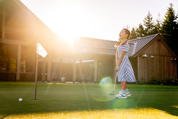 Laughing Girl on a Putting Green Inti St Clair Austin Texas Tumble Creek Scene Golf Green