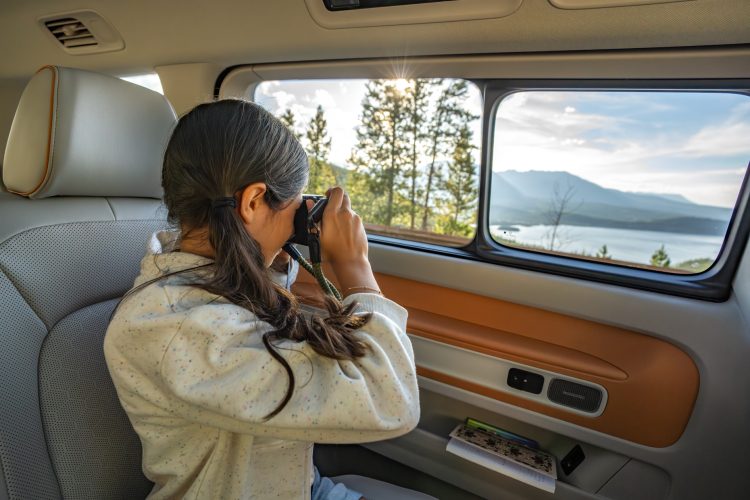 Child Photographing View from Car Window is iD Buzz