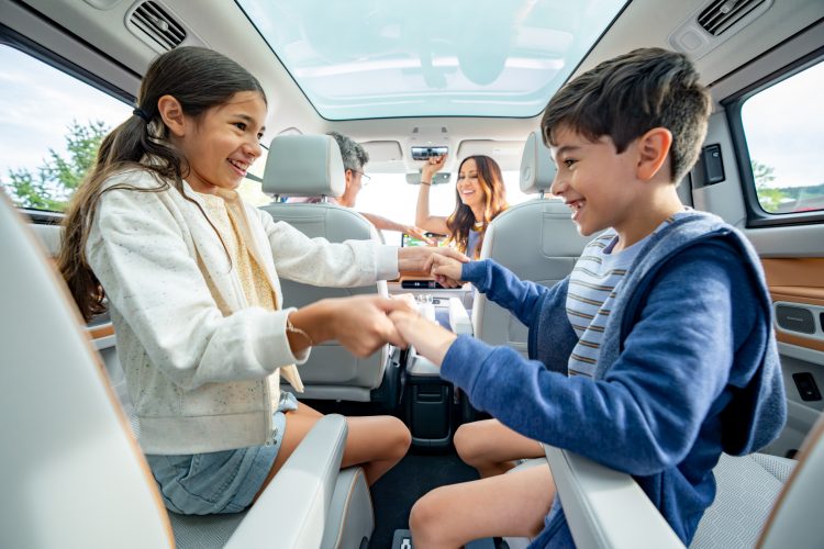 Children Playing in Back Seat is iD Buzz