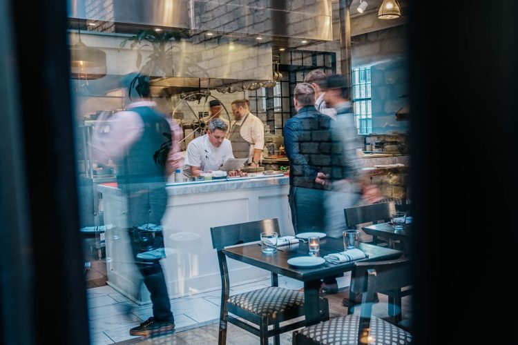 Chef in Busy Kitchen Restaurant