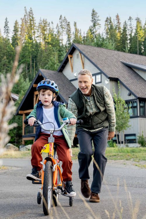 Child Learning to Ride Bike