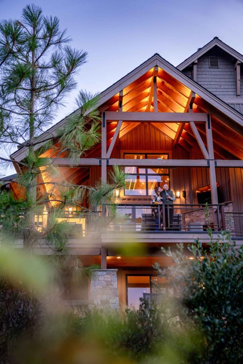 Couple Standing on Home Balcony