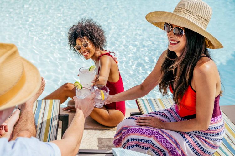 Friends Toast by Pool