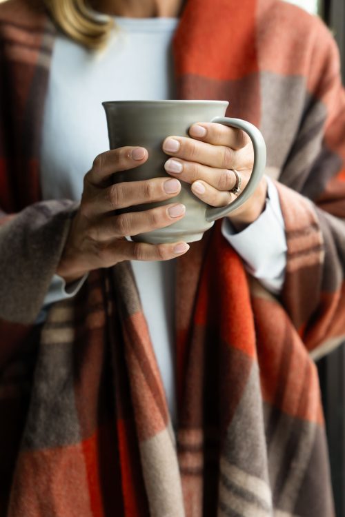 Hands Holding Mug