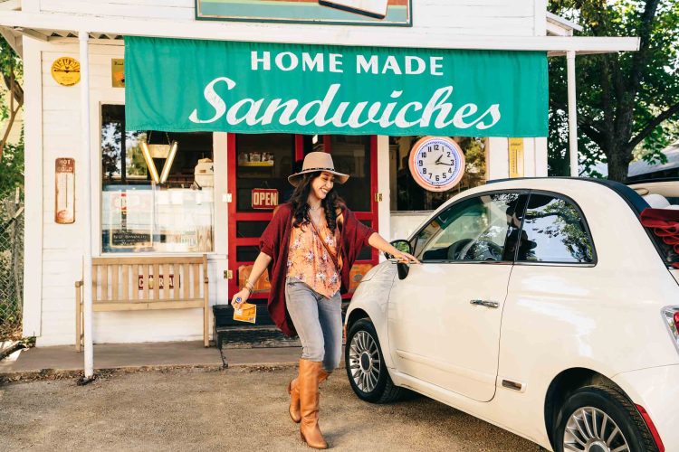Woman Leaving Sandwich Shop Getting into Car