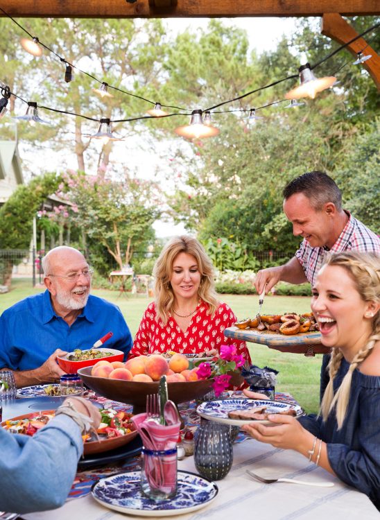 family dining outdoors Texas
