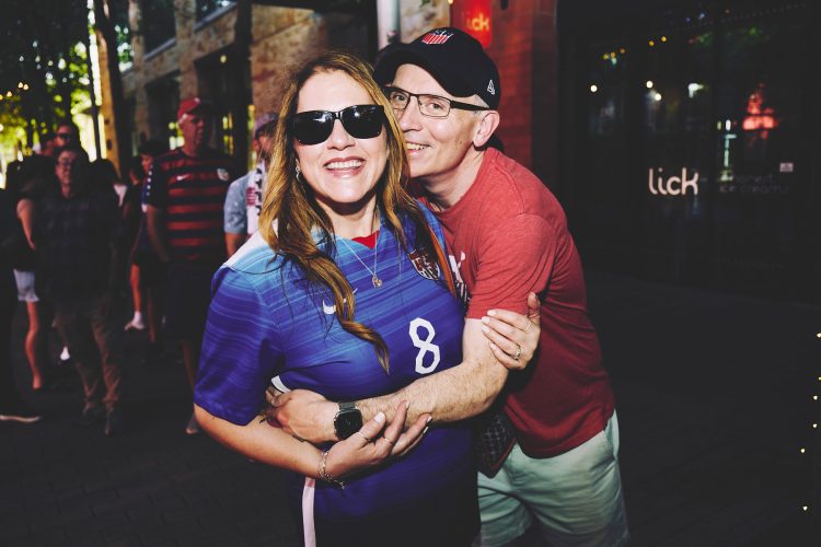 couple hugging soccer jersey number austin