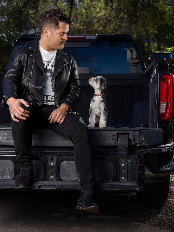 man black leather jacket truck puppy
