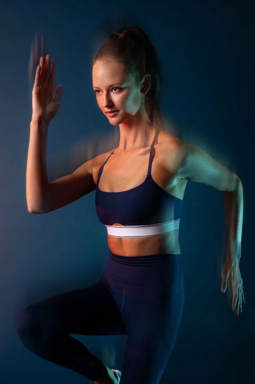 woman in workout clothes running